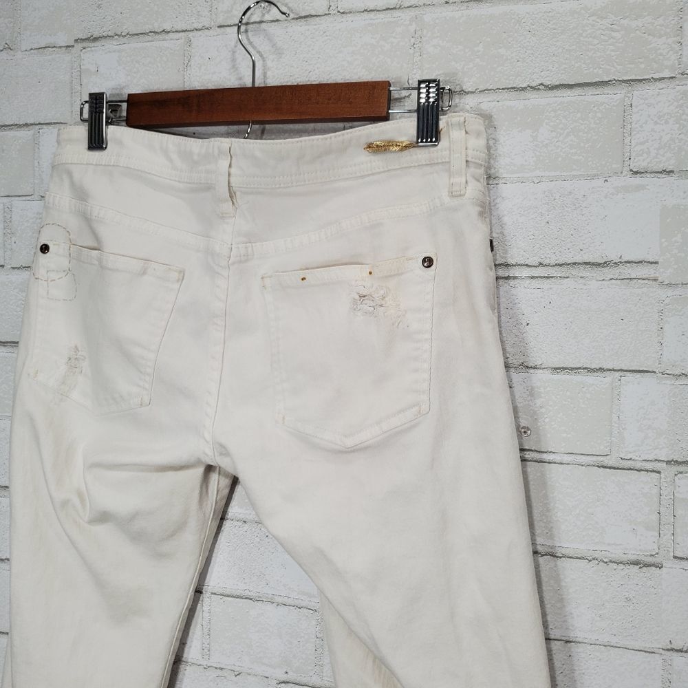 Women's Distressed White Patch Jeans - Picture 10 of 16
